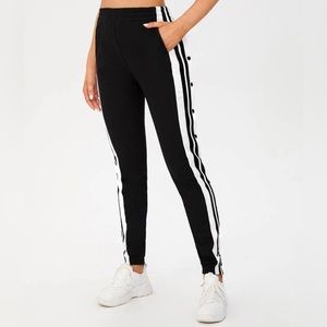 Black and white two-tone button side sweatpants